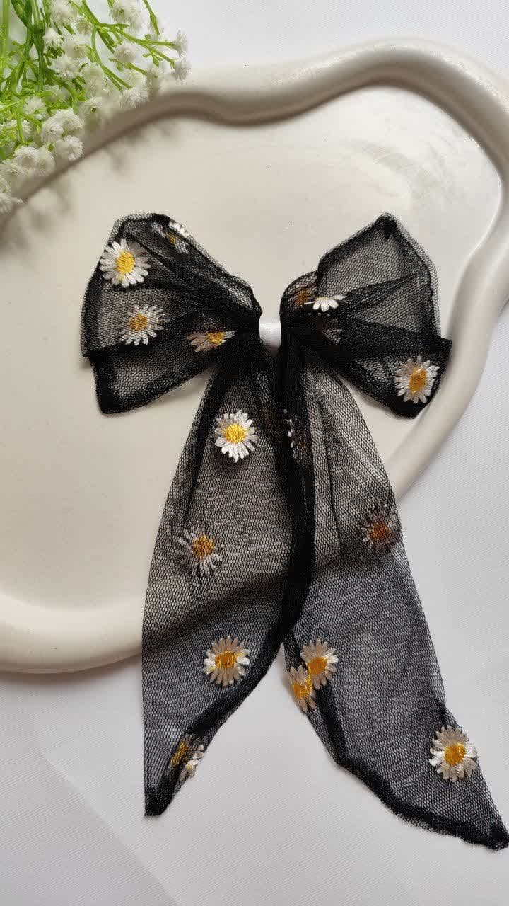 گیره مو زنانه طرح پاپیون و بابونه